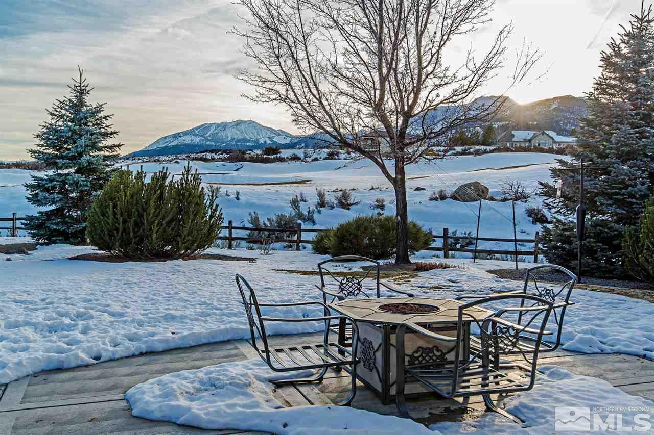 6965 Cour Street Reno, NV 89511 - Photo 25 of 25 a view of backyard with seating space and trees