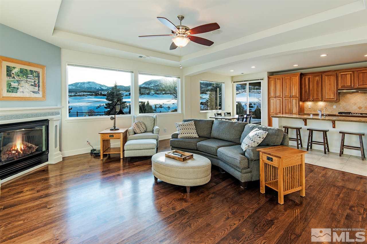 6965 Cour Street Reno, NV 89511 - Photo 3 of 25 a living room with furniture and a fireplace