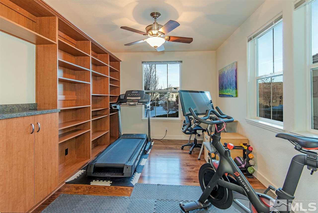 6965 Cour Street Reno, NV 89511 - Photo 8 of 25 a room with gym equipment and windows