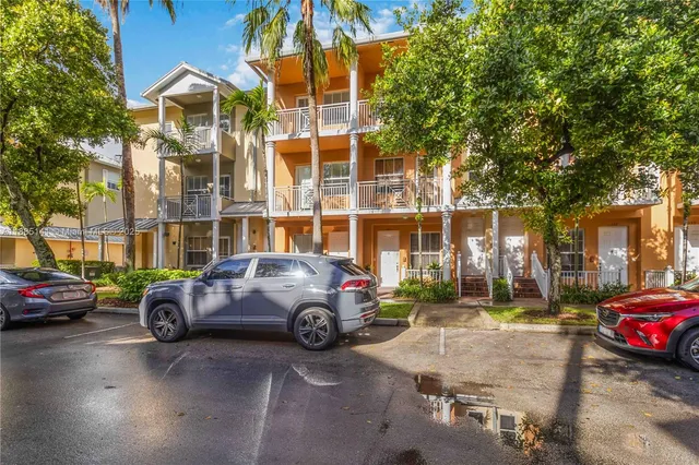 a car parked in front of a building