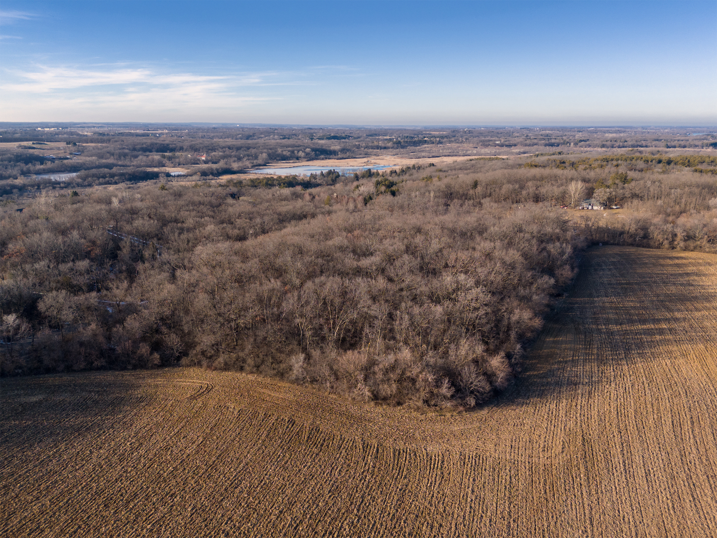 40-acres Bull Valley Road Bull Valley, IL 60098 - Photo 5 of 11 an aerial view of a house with a mountain