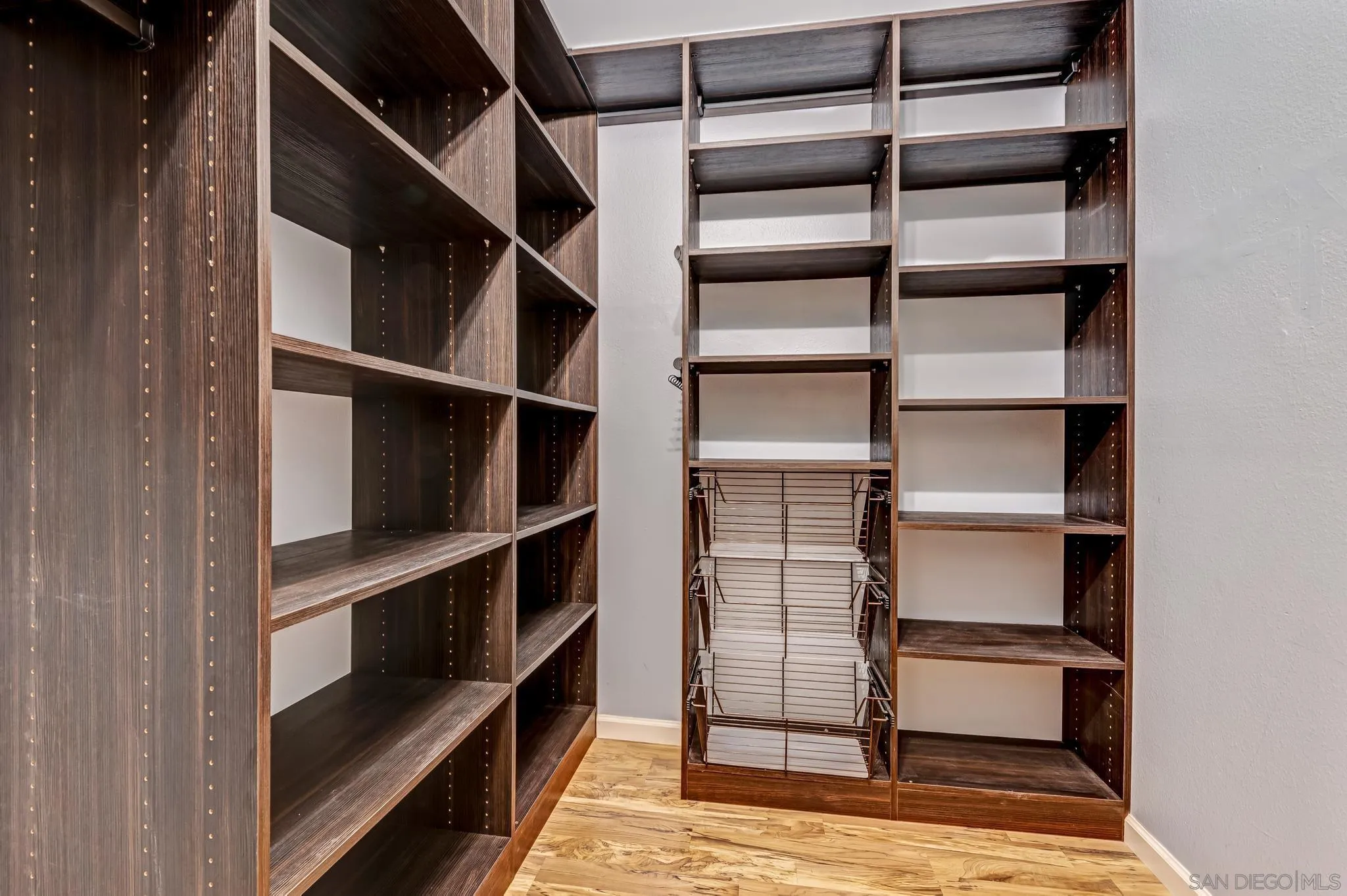 5370 La Jolla Boulevard, Unit 201B La Jolla, CA 92037 - Photo 15 of 31 a view of walk in closet with empty racks