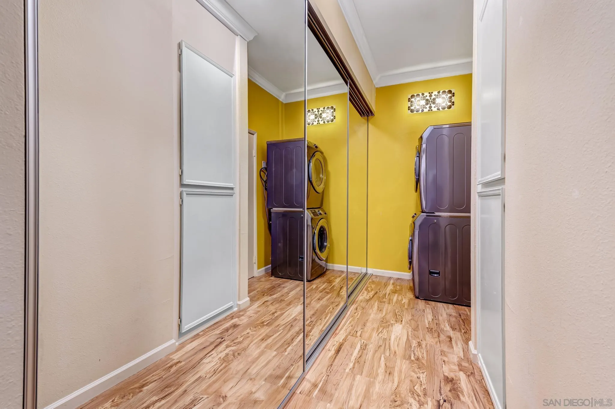 5370 La Jolla Boulevard, Unit 201B La Jolla, CA 92037 - Photo 16 of 31 a view of a room with wooden floor