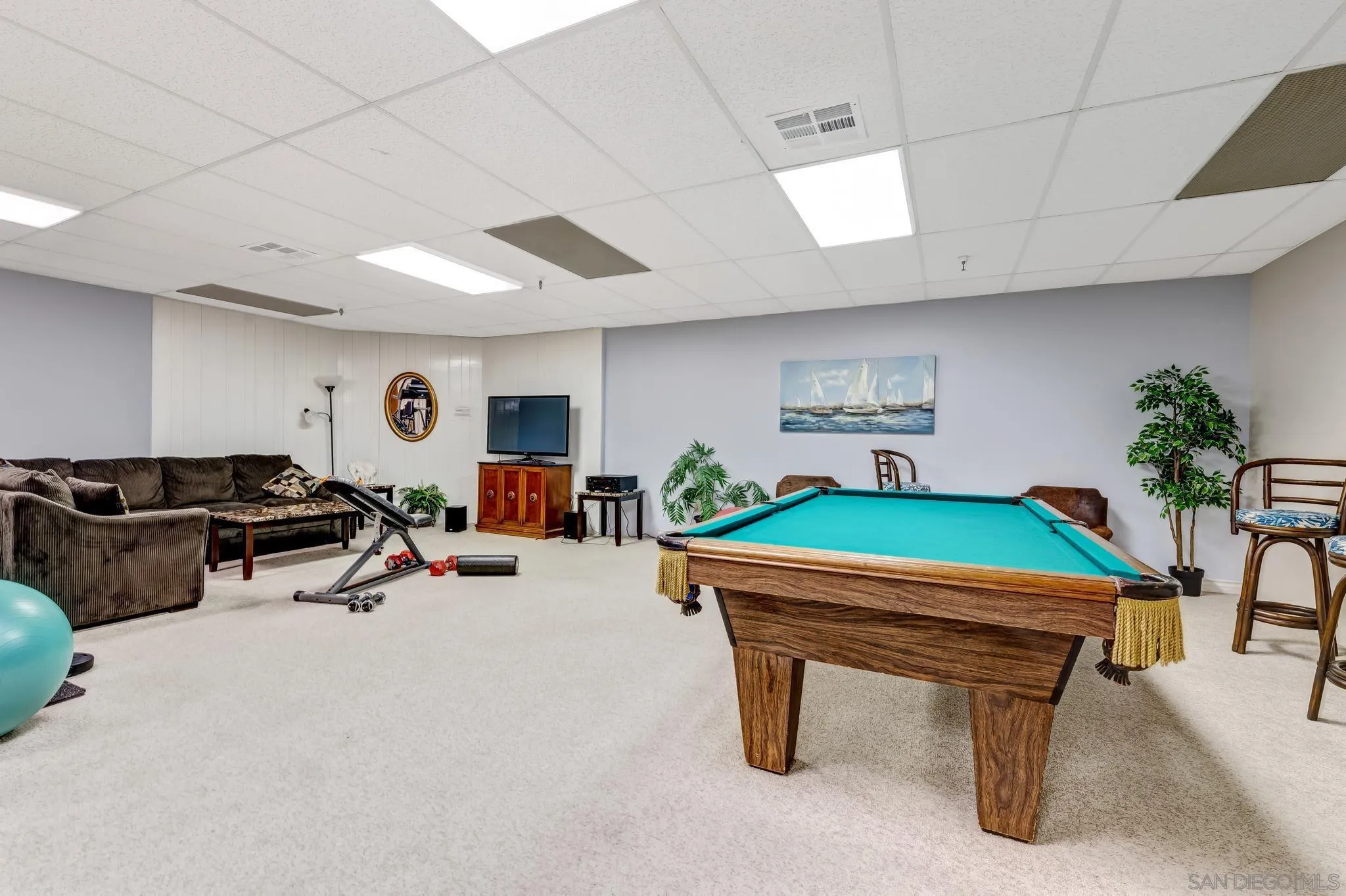 5370 La Jolla Boulevard, Unit 201B La Jolla, CA 92037 - Photo 22 of 31 a room with furniture and potted plants