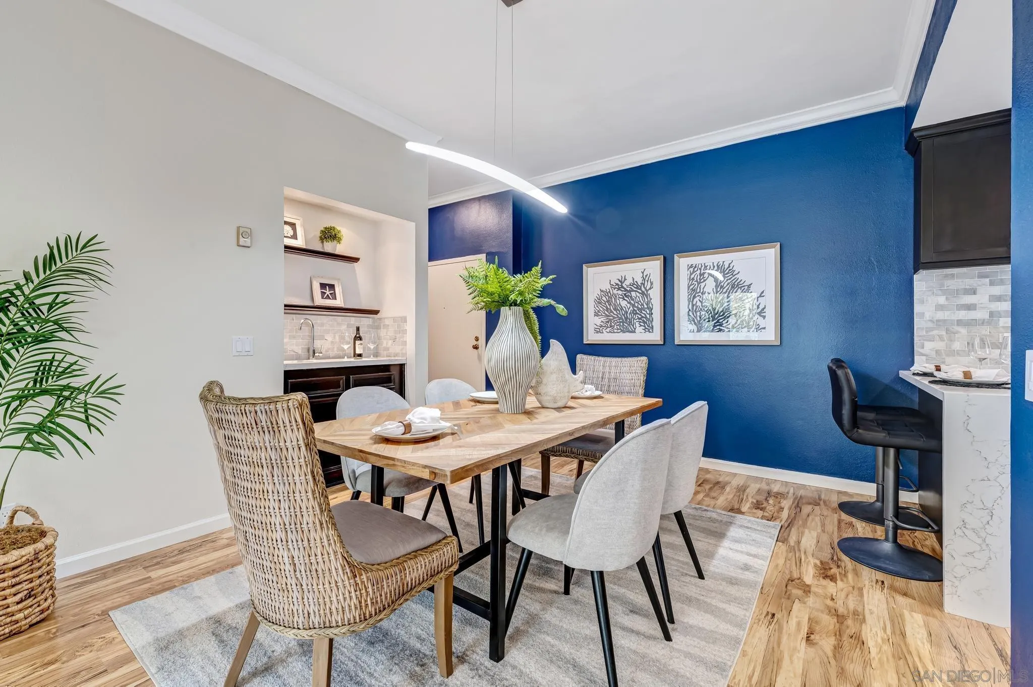 5370 La Jolla Boulevard, Unit 201B La Jolla, CA 92037 - Photo 4 of 31 a view of a dining room with furniture window and wooden floor