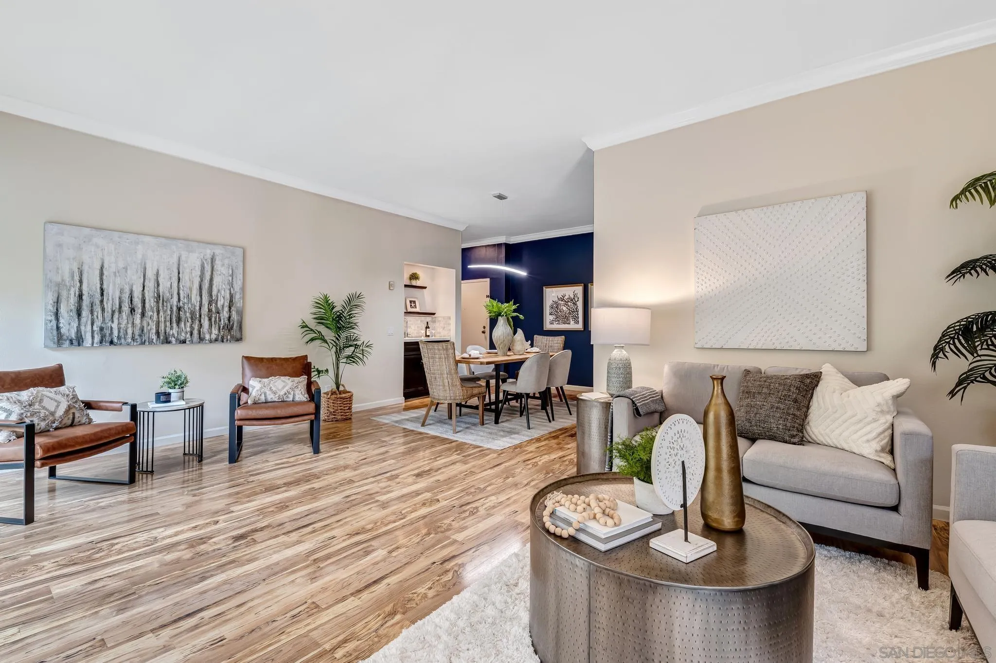 5370 La Jolla Boulevard, Unit 201B La Jolla, CA 92037 - Photo 7 of 31 a living room with furniture and wooden floor
