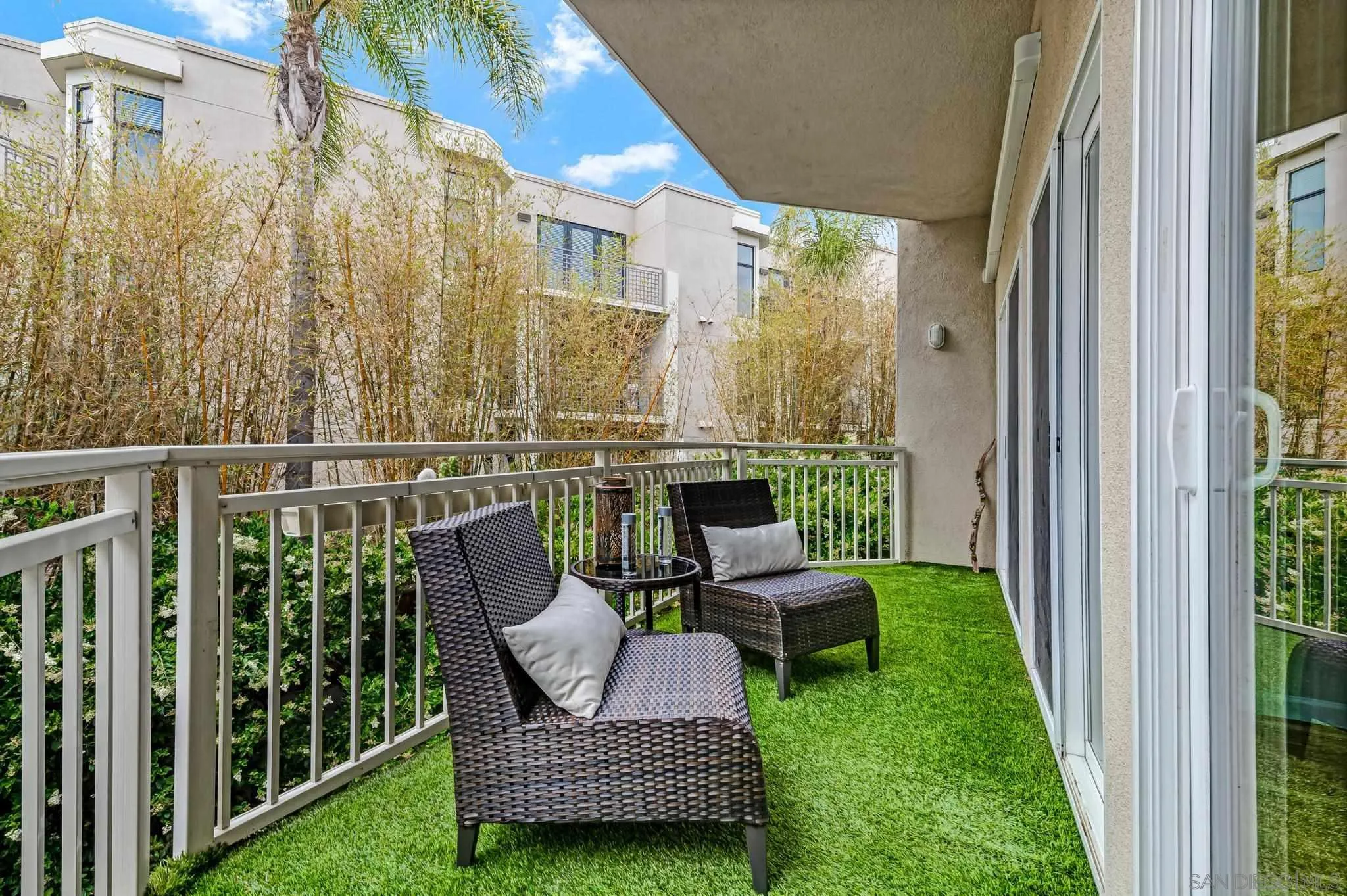 5370 La Jolla Boulevard, Unit 201B La Jolla, CA 92037 - Photo 9 of 31 a view of a chair and tables in the balcony
