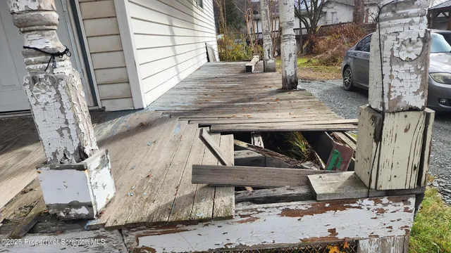 a view of entryway with wooden walls