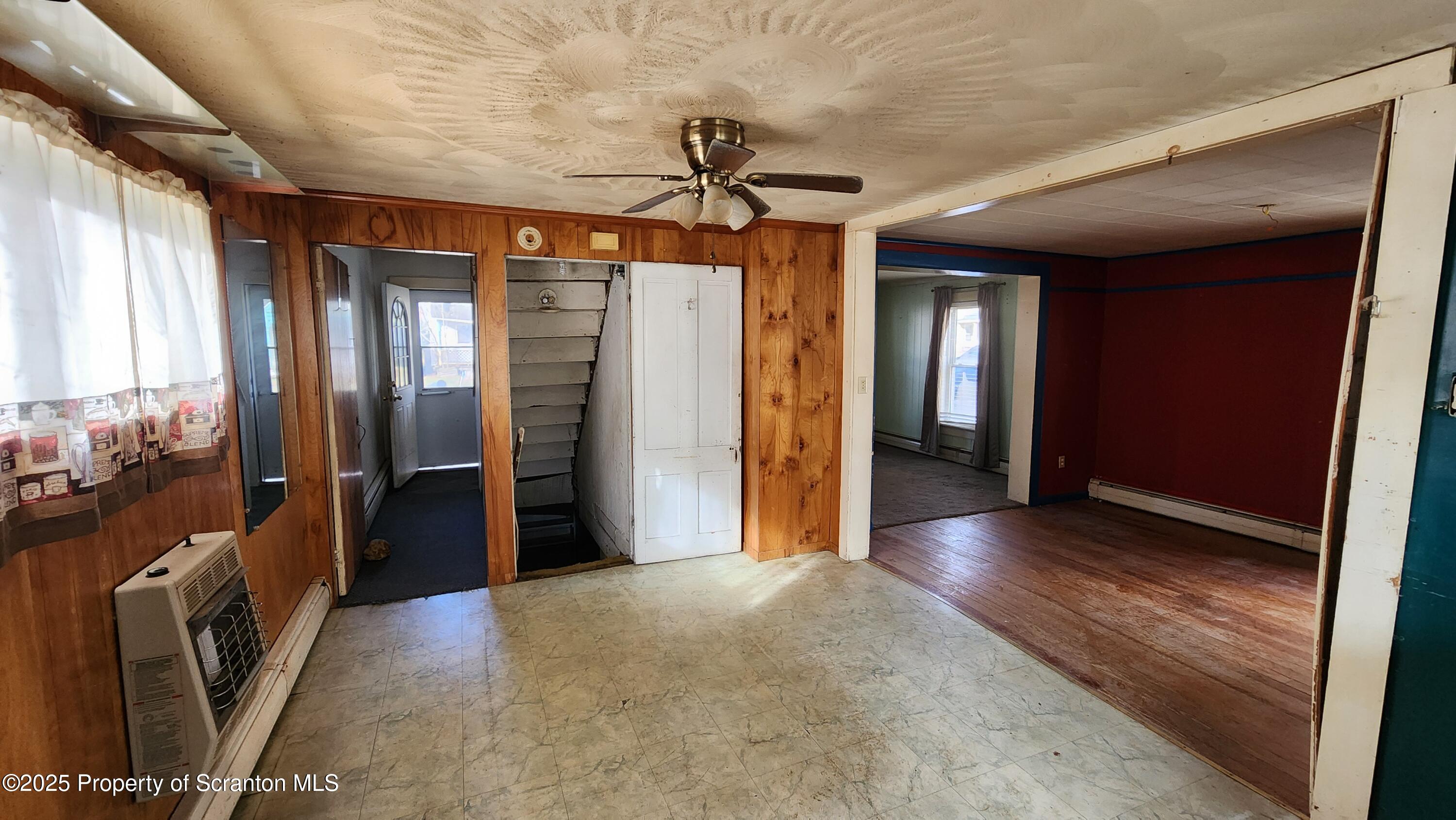 40 William Street Hallstead, PA 18822 - Photo 8 of 31 a view of a hallway with wooden shelves