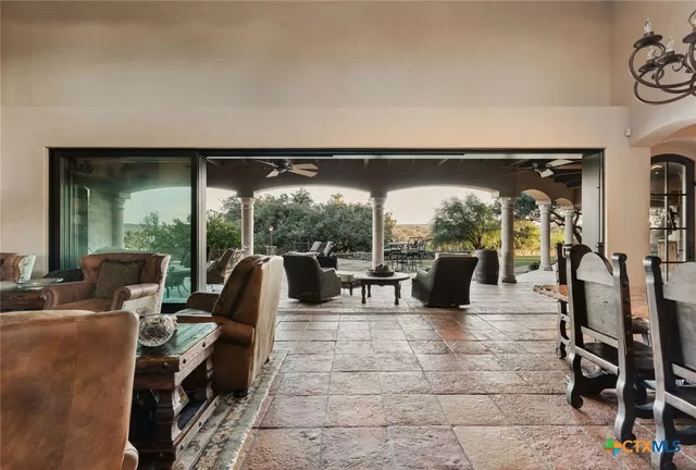 a living room with furniture and a window