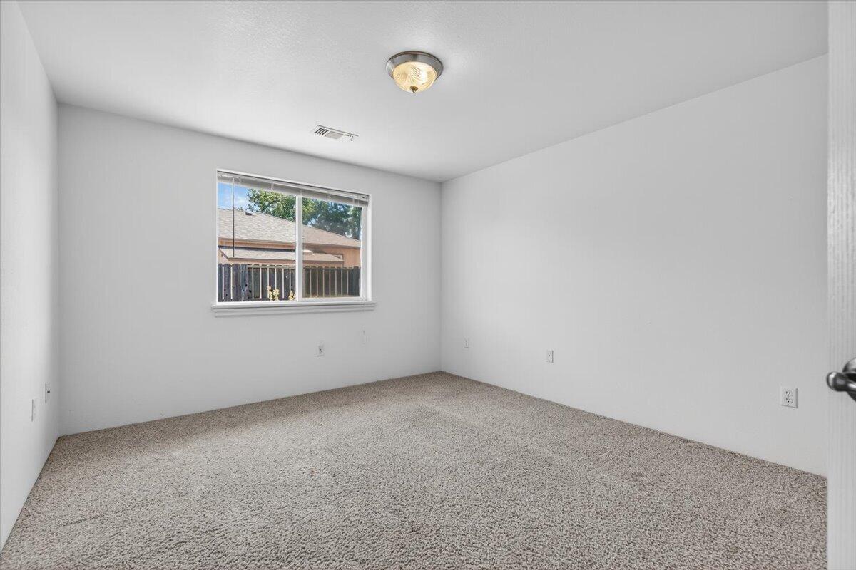 2618 Rabun Way Central Point, OR 97502 - Photo 29 of 42 an empty room with windows