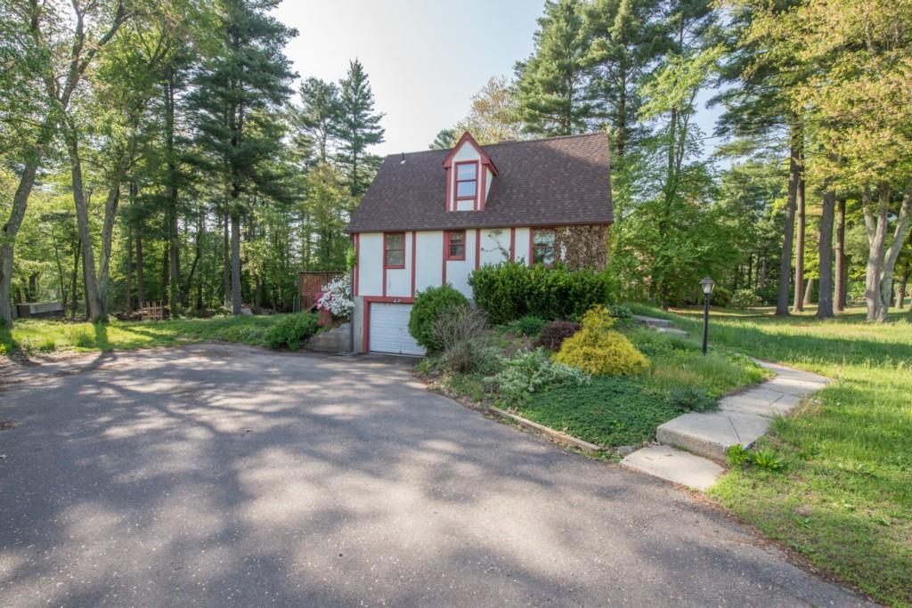 603 Taylor Road Enfield, CT 06082 - Photo 1 of 1 a front view of a house with garden