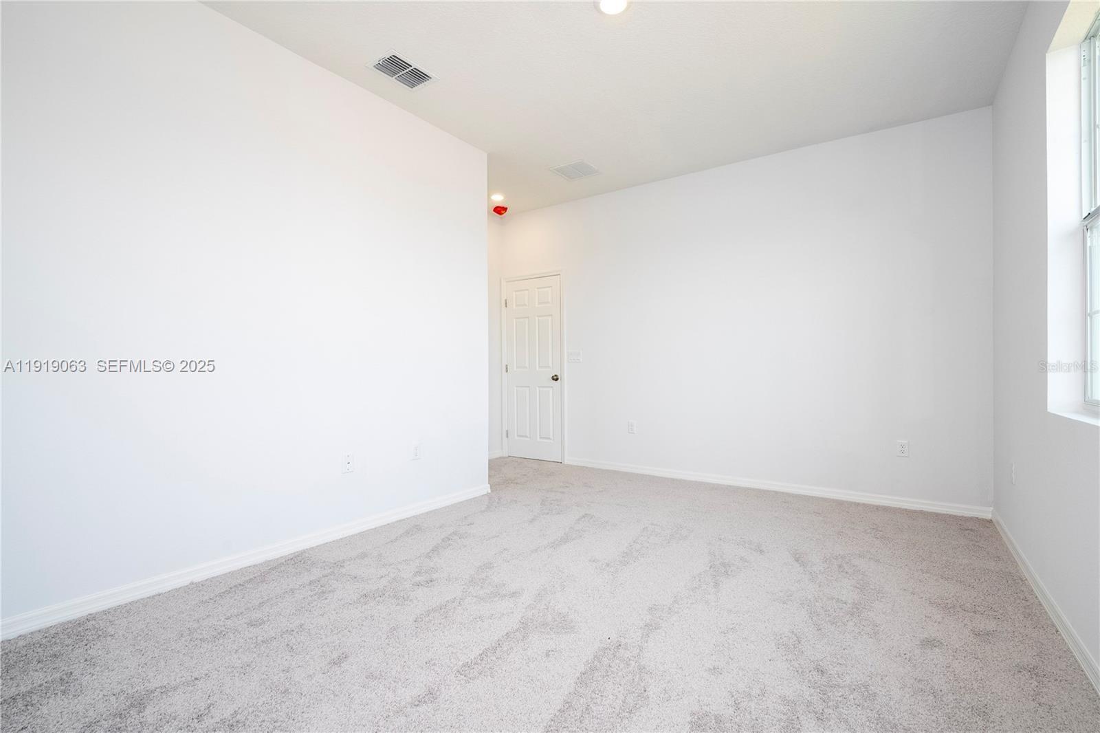 833 Colville Drive, Unit 833 Kissimmee, FL 34759 - Photo 30 of 47 a view of an empty room