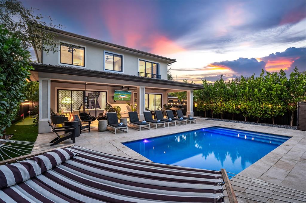 620 Southwest 12th Avenue Fort Lauderdale, FL 33312 - Photo 1 of 49 a view of a swimming pool with sitting area