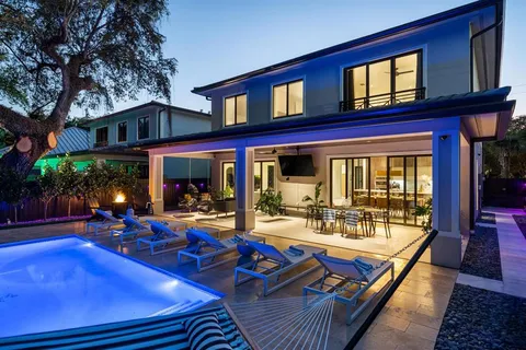 a view of a chairs and table in a patio