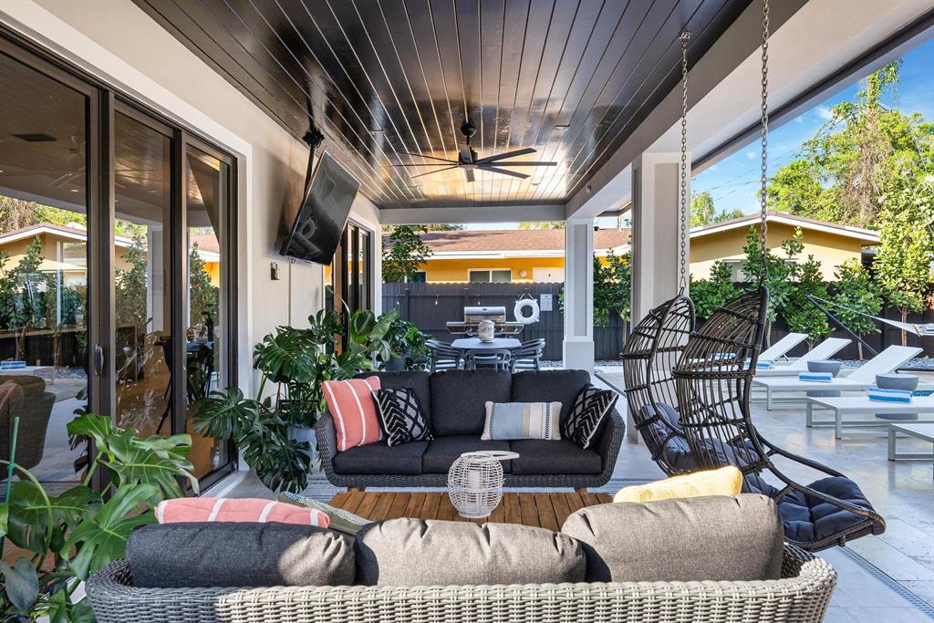 620 Southwest 12th Avenue Fort Lauderdale, FL 33312 - Photo 15 of 49 a outdoor living space with furniture and a large window