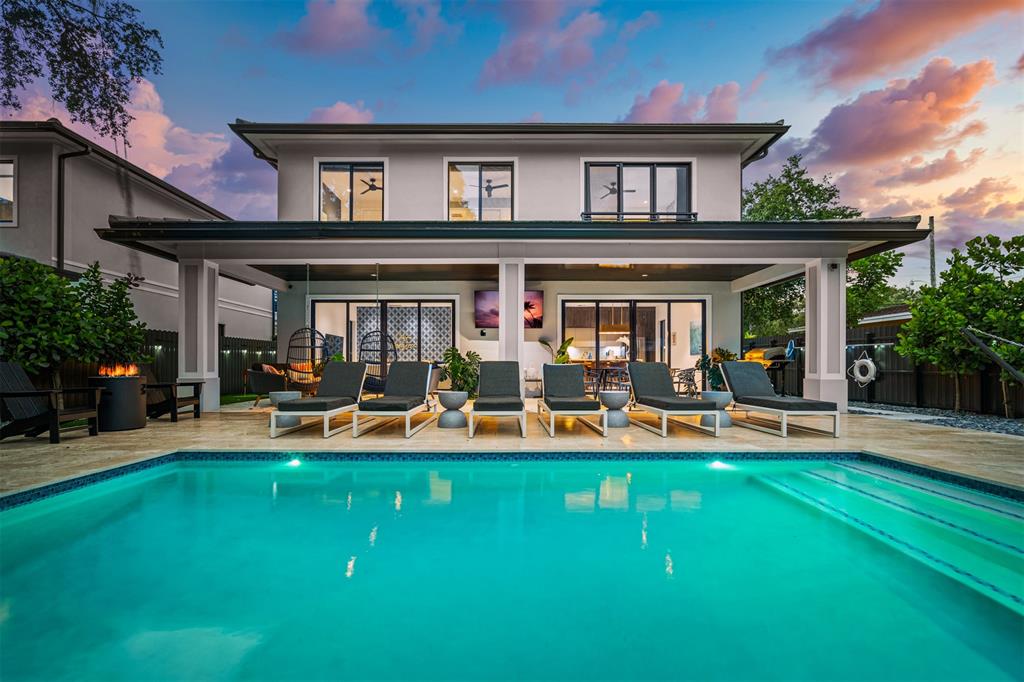 620 Southwest 12th Avenue Fort Lauderdale, FL 33312 - Photo 17 of 49 a front view of a house with patio and garden