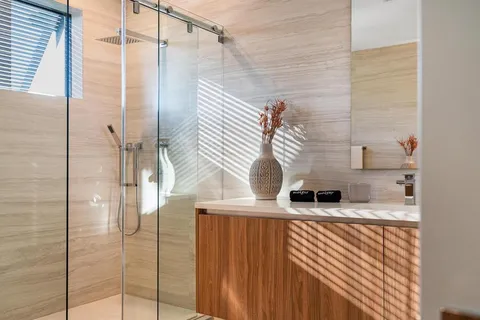 a bathroom with a sink and a shower