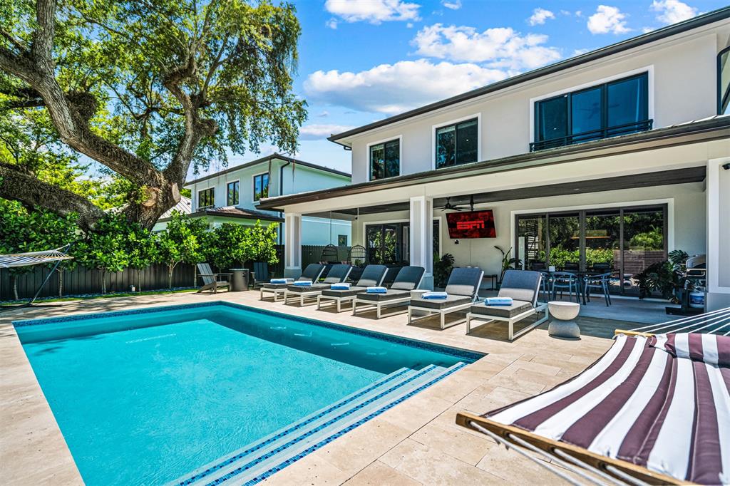 620 Southwest 12th Avenue Fort Lauderdale, FL 33312 - Photo 46 of 49 a view of a house with swimming pool and sitting area