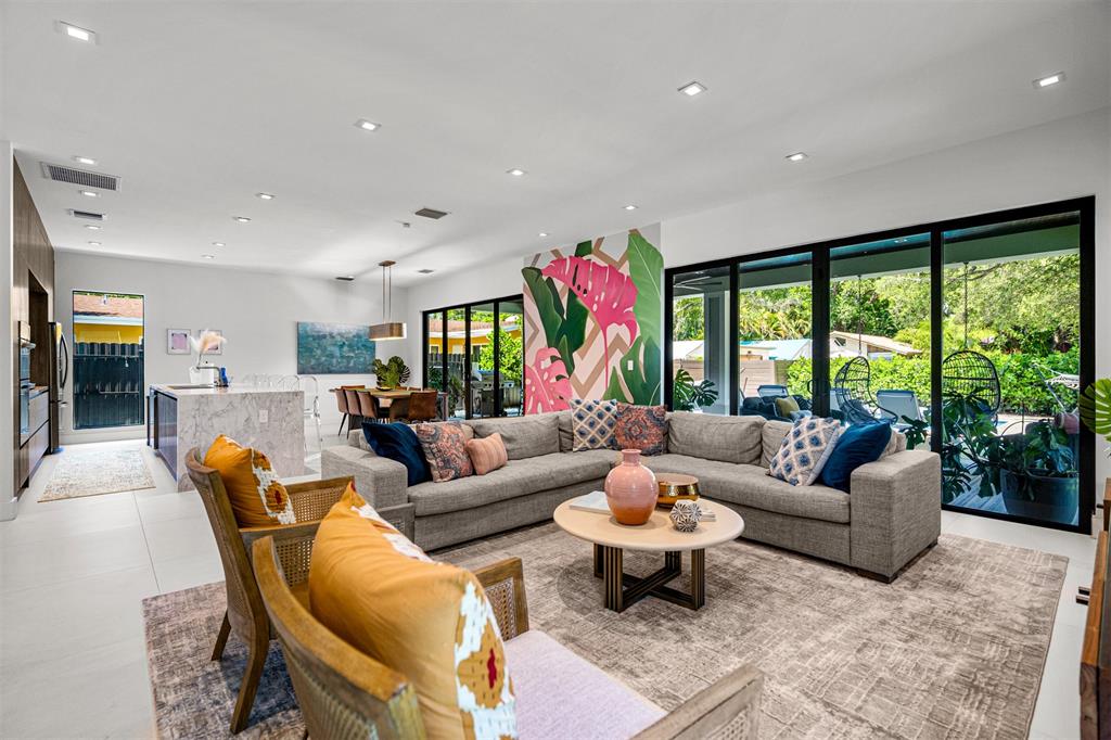 620 Southwest 12th Avenue Fort Lauderdale, FL 33312 - Photo 7 of 49 a living room with furniture and a large window