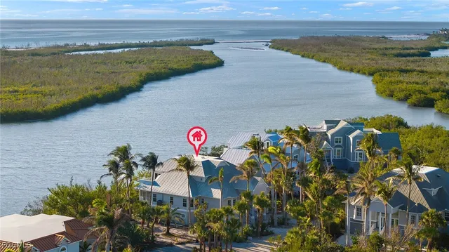 a view of a lake with a building in the background