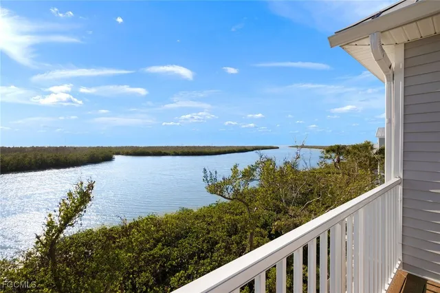 a view of a lake from a balcony