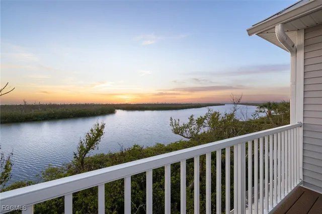 a view of a balcony with chair