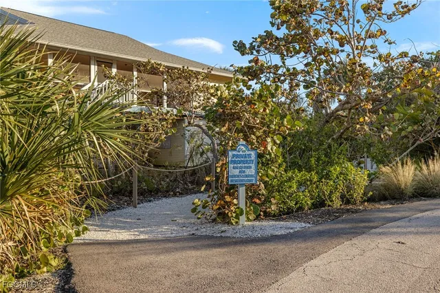 a view of a swimming pool with a yard