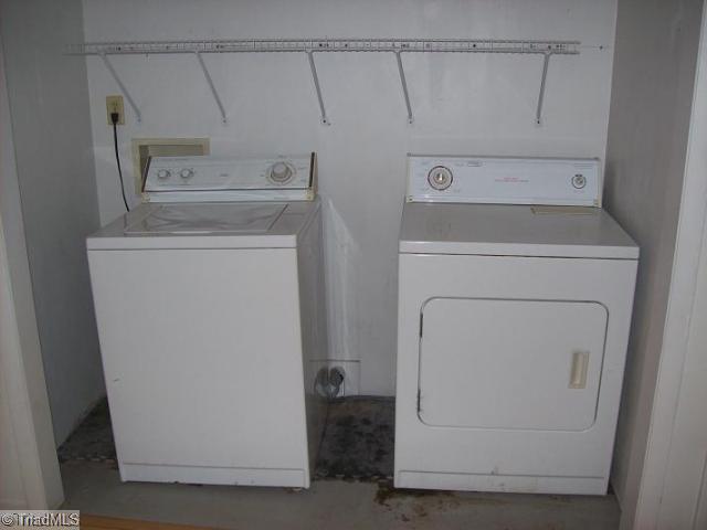 1706 Three Meadows Road Greensboro, NC 27455 - Photo 12 of 12 Exterior Front. Laundry Room in Basement. These units may not work and we may remove.