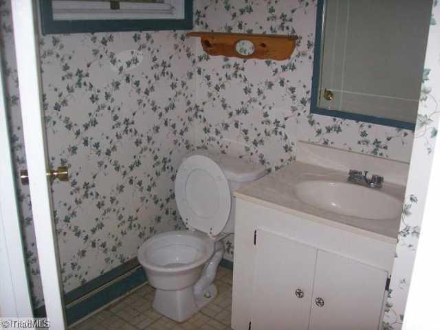 1706 Three Meadows Road Greensboro, NC 27455 - Photo 4 of 12 Exterior Front. Bathroom Main Floor