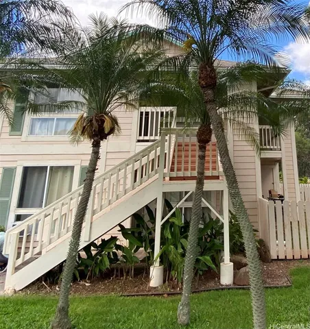 front view of a house with a small yard