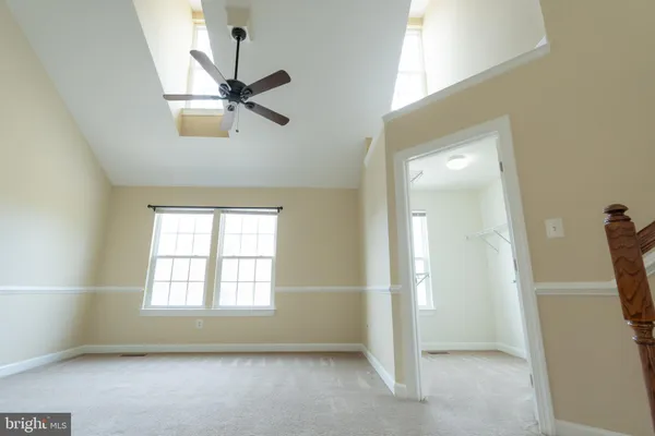 a bathroom with a shower and a sink