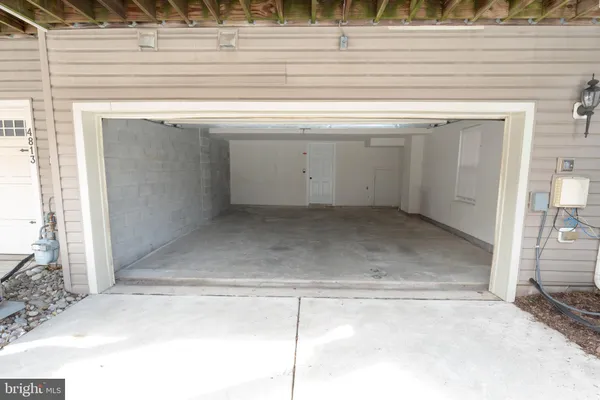 a view of a house with a balcony and stairs