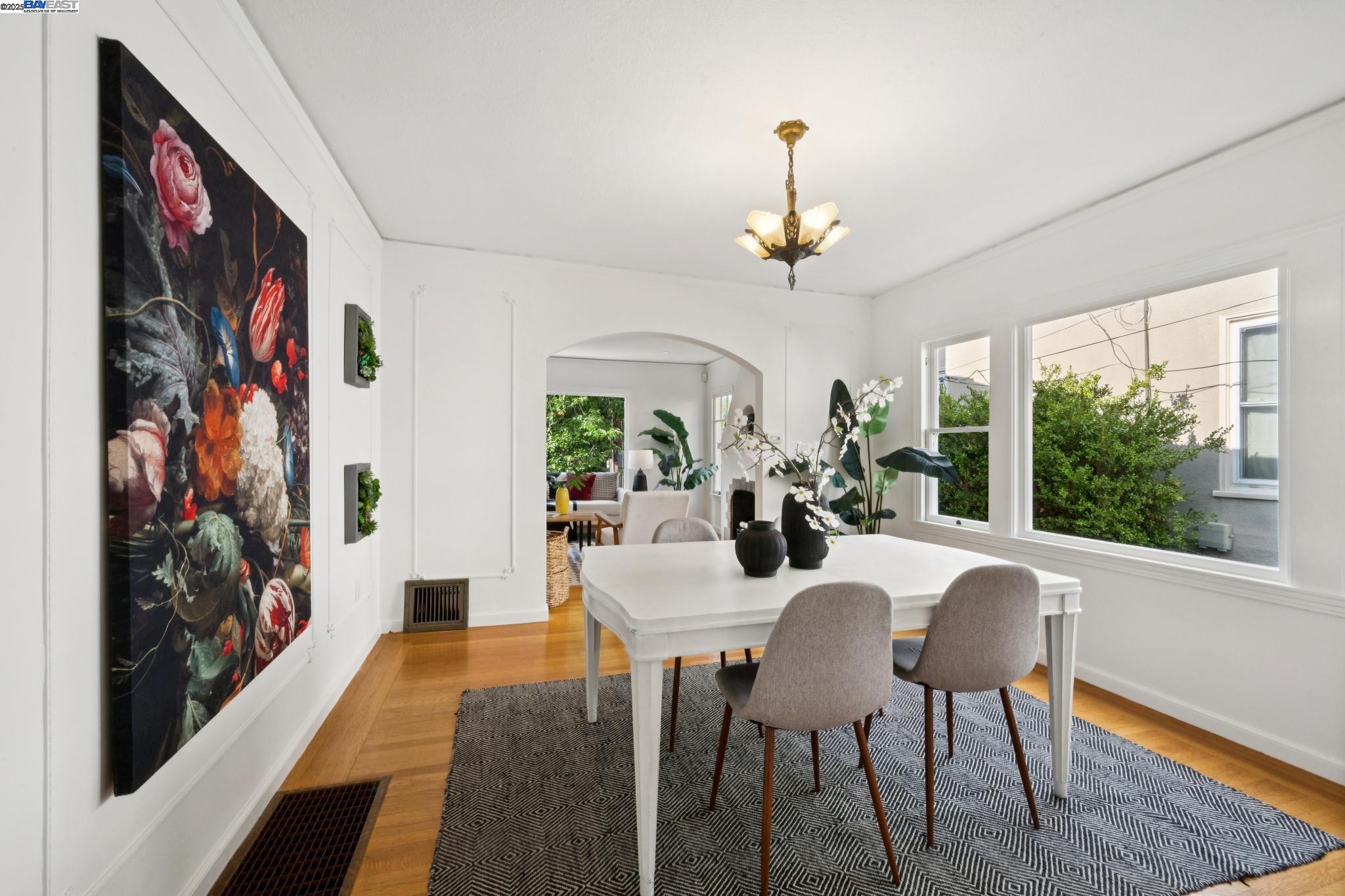 3047 Halcyon Court Berkeley, CA 94705 - Photo 14 of 45 a view of a dining room with furniture wooden floor and chandelier