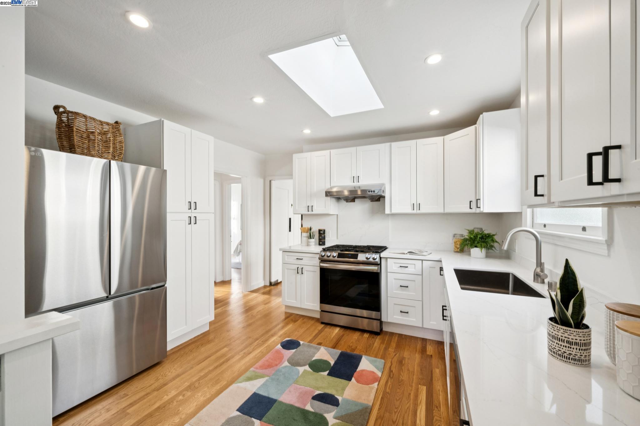 3047 Halcyon Court Berkeley, CA 94705 - Photo 18 of 45 a kitchen with stainless steel appliances granite countertop a refrigerator sink and stove