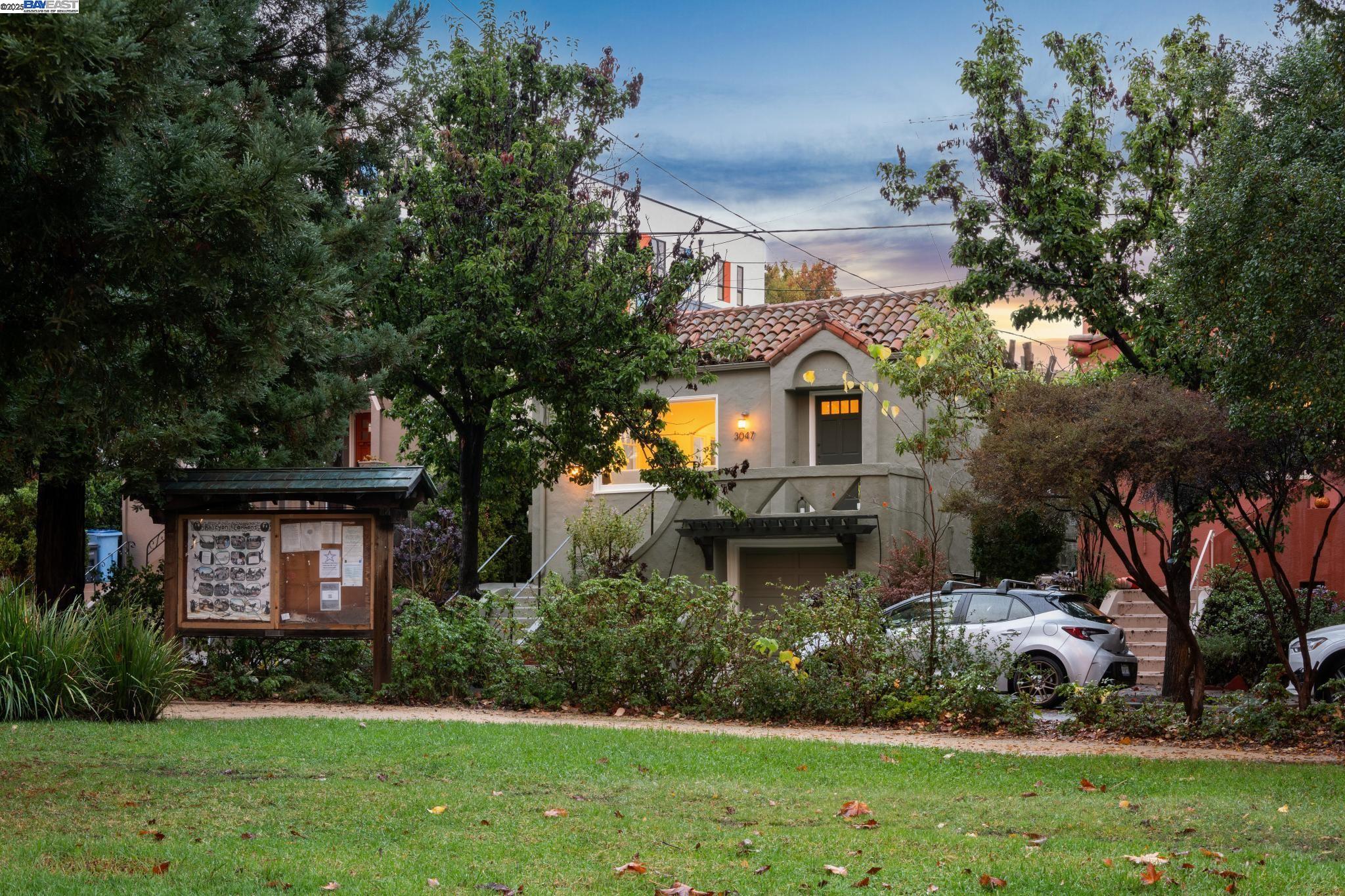 3047 Halcyon Court Berkeley, CA 94705 - Photo 5 of 45 a front view of a house with a yard and fountain