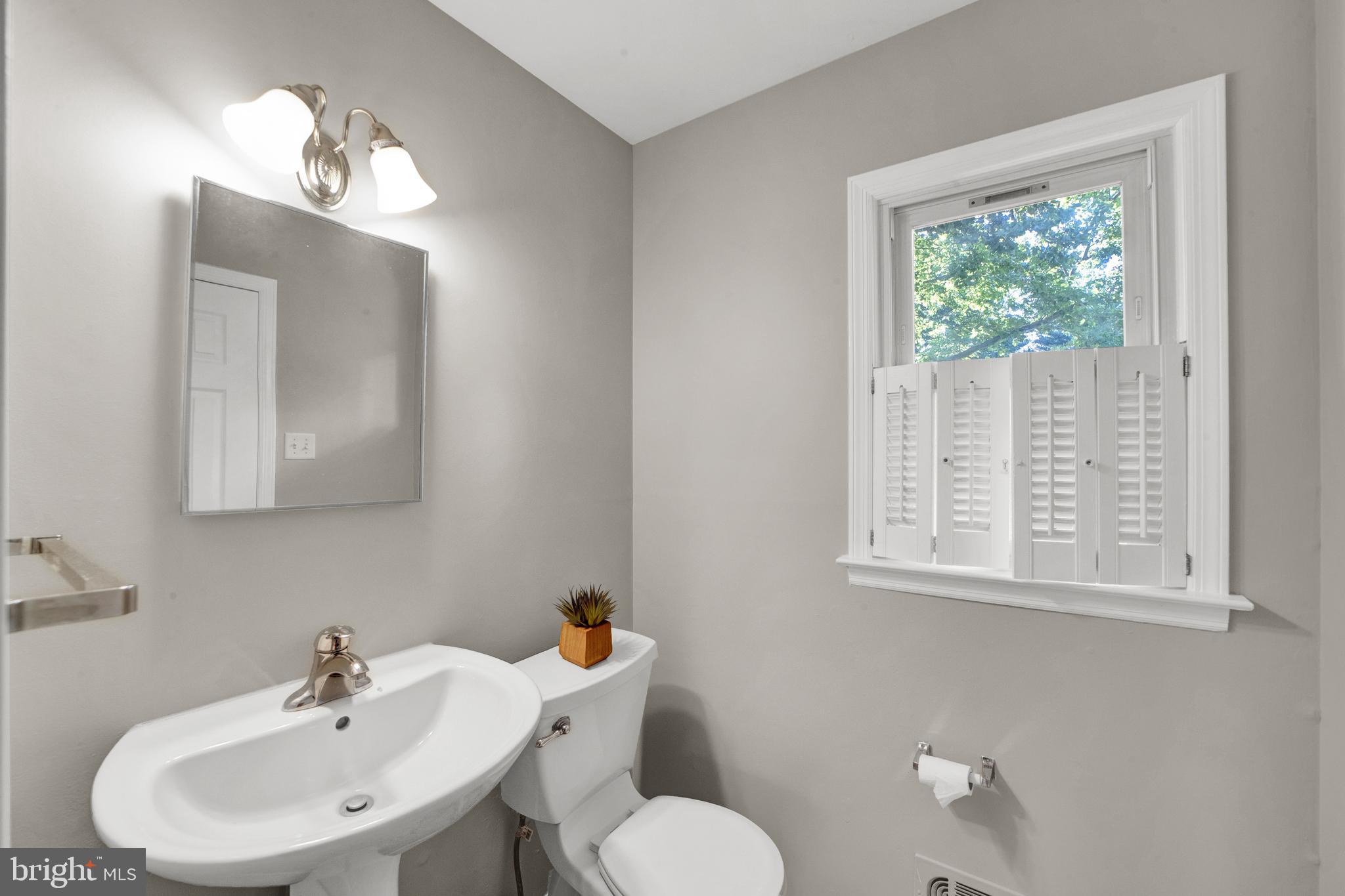 382 Burnt Hill Road Skillman, NJ 08558 - Photo 23 of 49 a bathroom with a sink a toilet and mirror