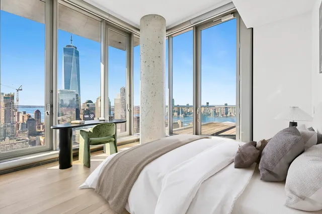 a bathroom with a toilet and shower