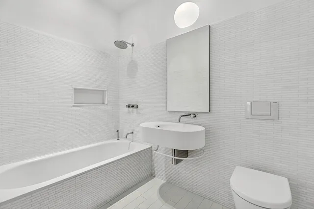 a living room with a couch and a table