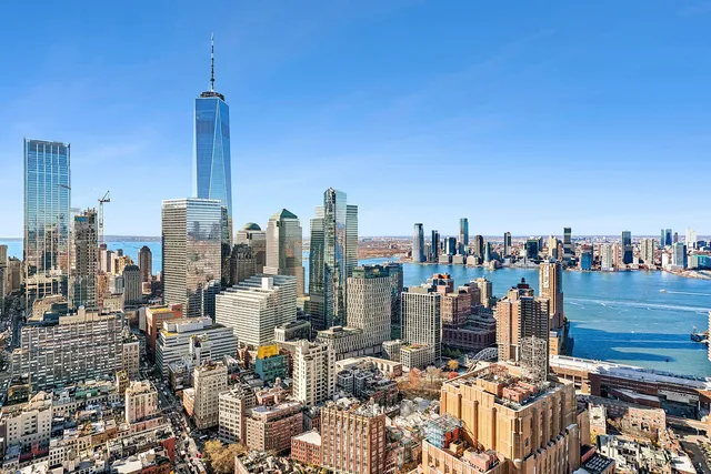 a view of roof deck with seating space and barbeque oven