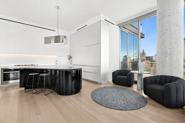 a kitchen with a stove and a table