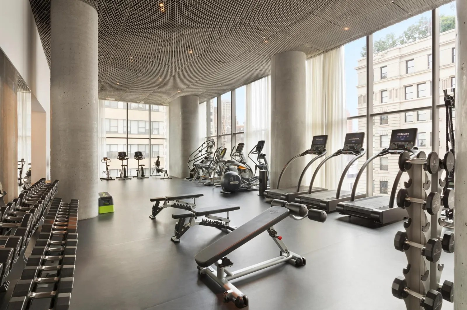 56 Leonard Street, Unit 47WEST Manhattan, NY 10013 - Photo 9 of 13 a view of a room with gym equipment