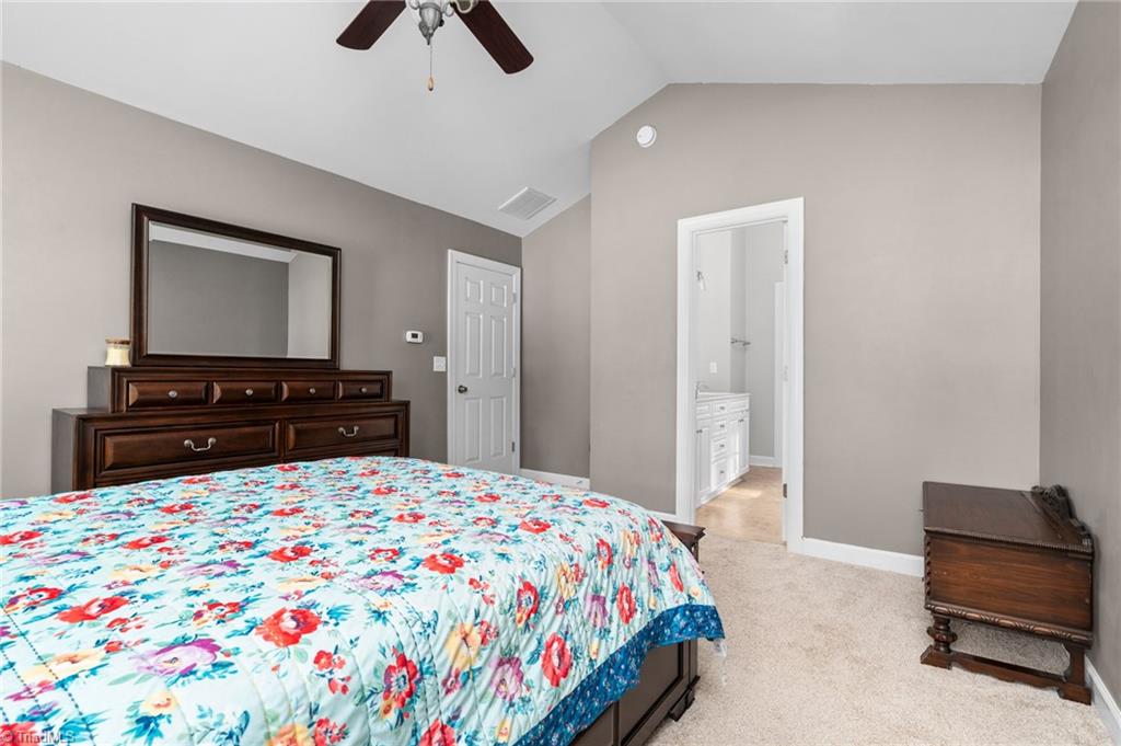 7514 Fairhaven Road Browns Summit, NC 27214 - Photo 23 of 49 Primary Bedroom