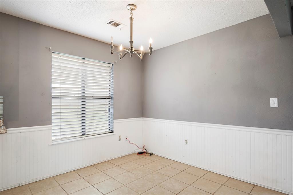 1106 HCR 1414 Covington, TX 76636 - Photo 17 of 38 a view of empty room with windows