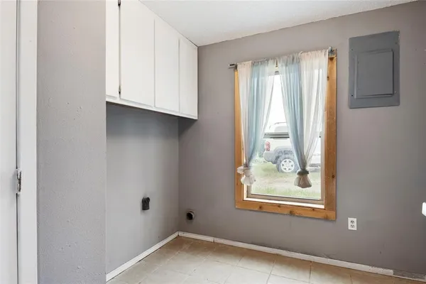 an empty room with windows