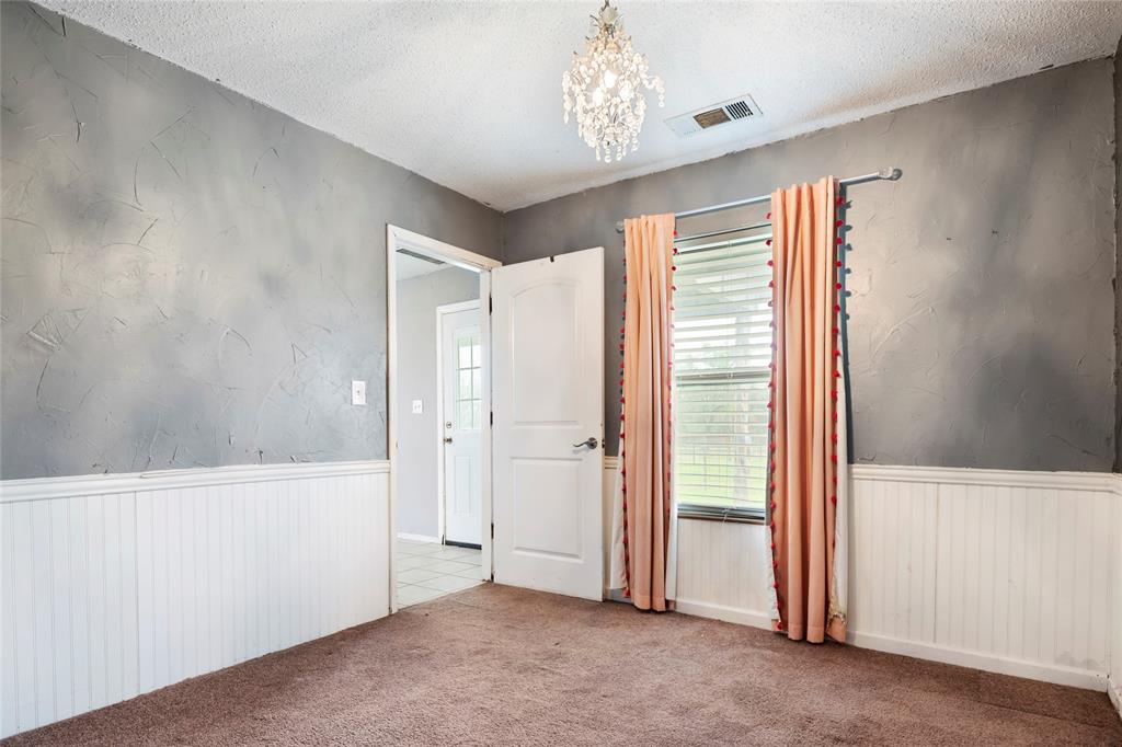 1106 HCR 1414 Covington, TX 76636 - Photo 24 of 37 a view of empty room with a window