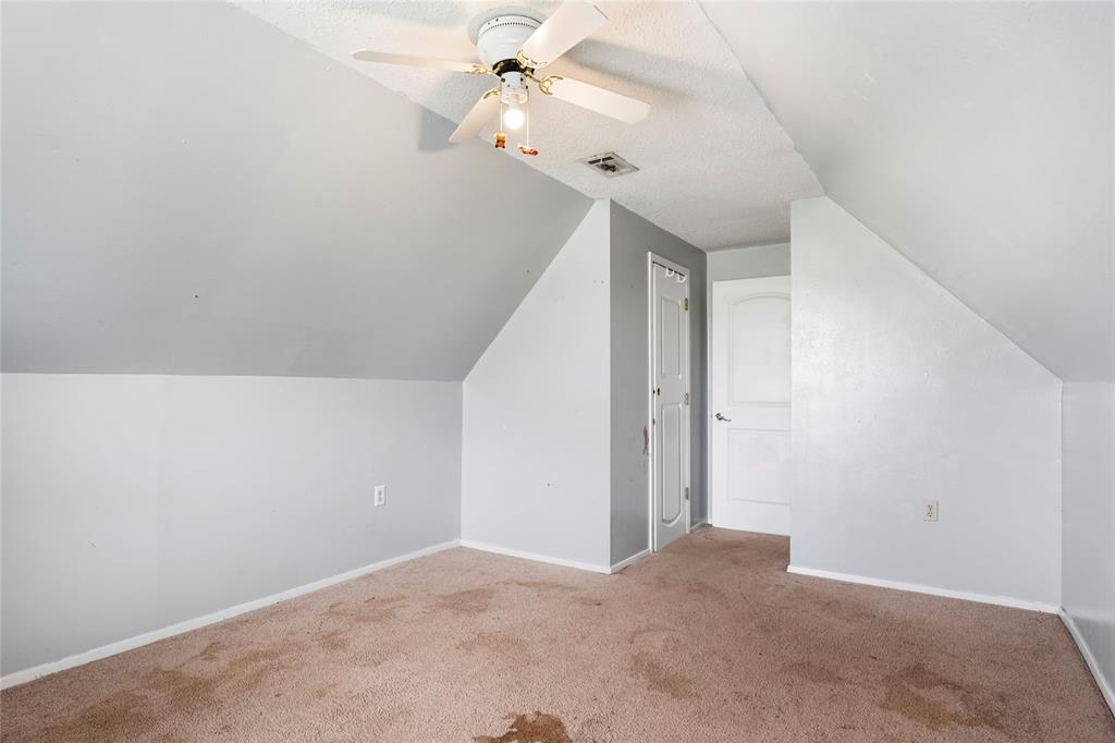 1106 HCR 1414 Covington, TX 76636 - Photo 30 of 37 a view of a hallway with a chandelier fan