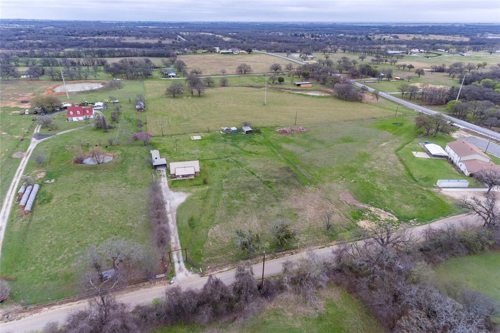 1106 HCR 1414 Covington, TX 76636 - Photo 35 of 37 a view of a lake with a mountain in the background