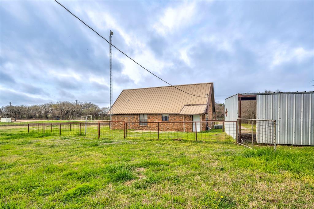 1106 HCR 1414 Covington, TX 76636 - Photo 5 of 37 a view of an outdoor space and yard