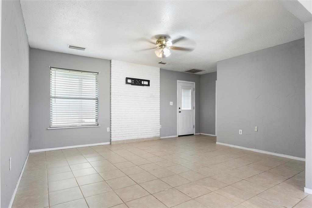 1106 HCR 1414 Covington, TX 76636 - Photo 9 of 37 a view of an empty room with a window